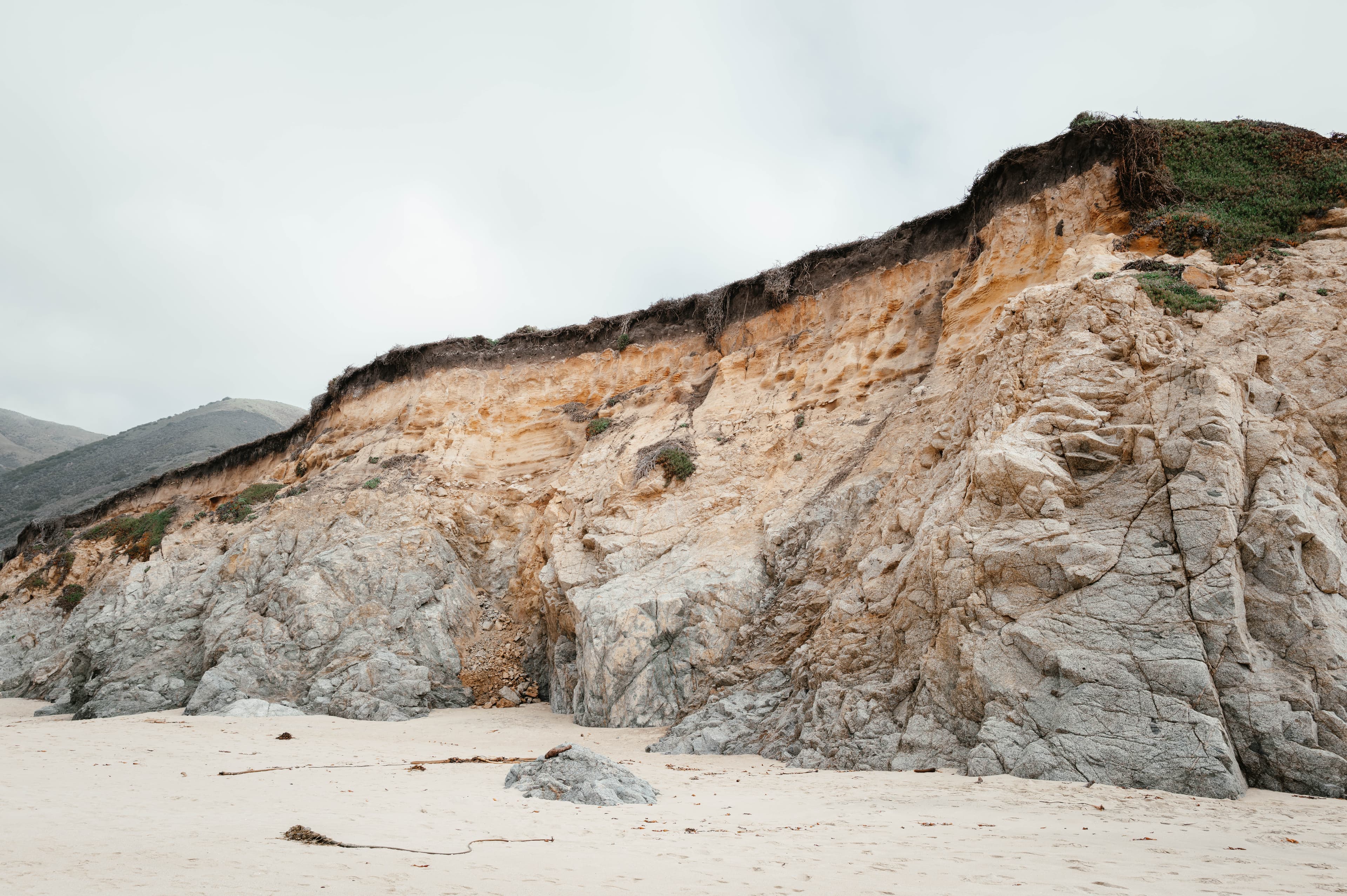 Rocky walls on the beach